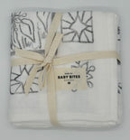 Baby Bites Chocolate Jungle bamboo muslin swaddle blanket with jungle animals and chocolate illustrations folded