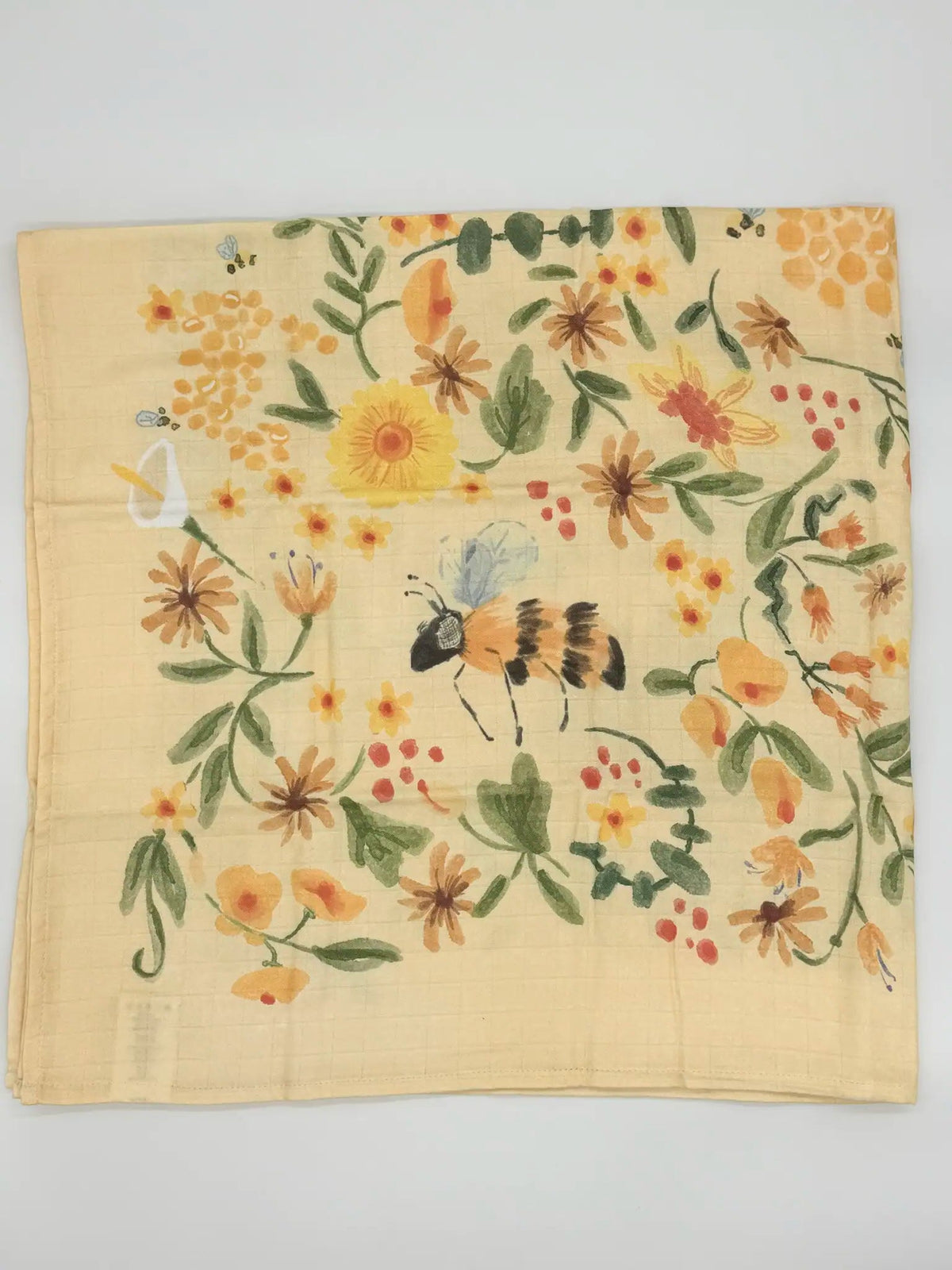 Baby Bites Honey Farm bamboo muslin swaddle blanket with bees, flowers and honeycomb illustrations quarter2