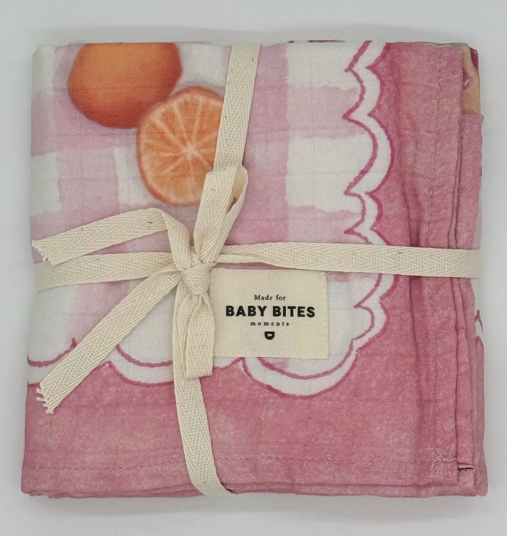 Baby Bites Strawberry House baby muslin with strawberry picnic pattern folded